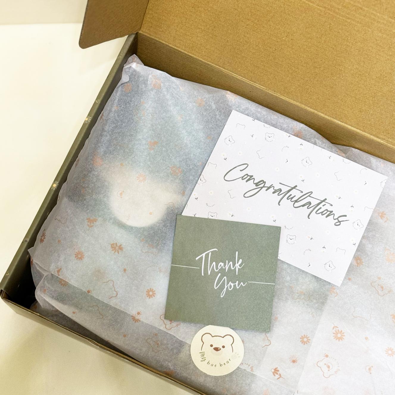 Gift box with congratulations card